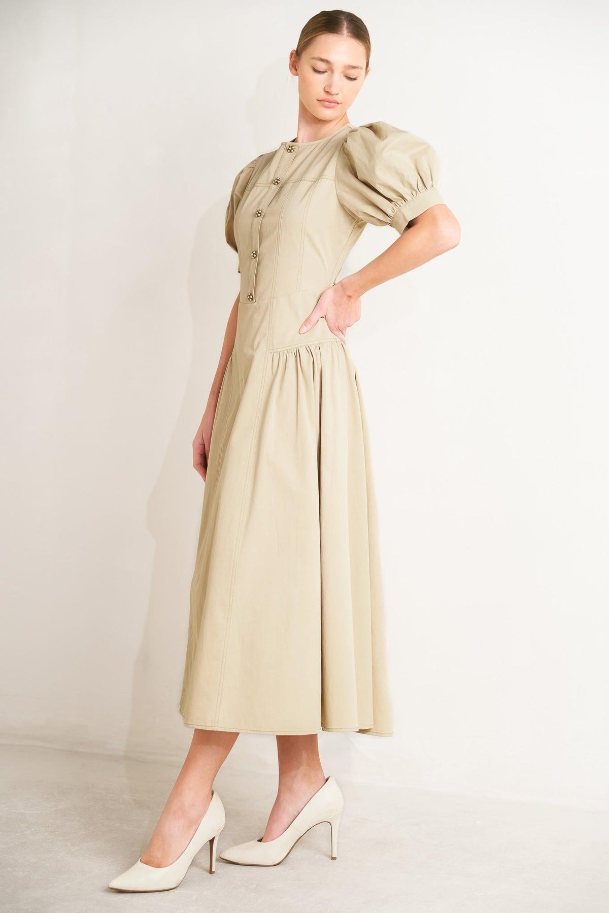 VESTIDO MIDI TEJIDO DE ICONO SUTIL