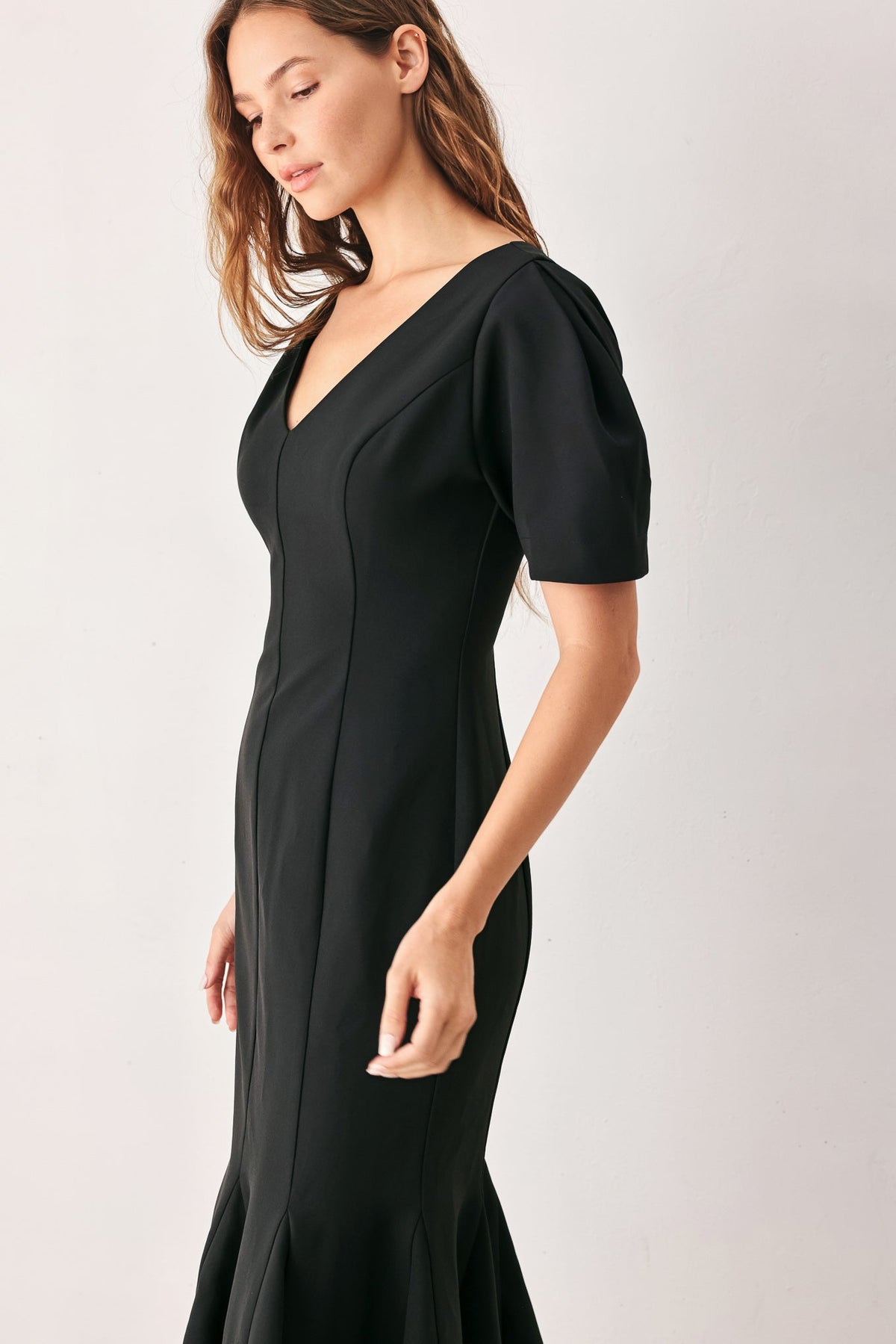 VESTIDO MIDI DE PUNTO CON MANGAS ABULLONADAS SOIRÉE