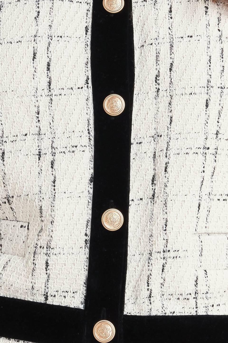 CHAQUETA CORTA DE TWEED TEJIDO CON DESTINO A PARÍS
