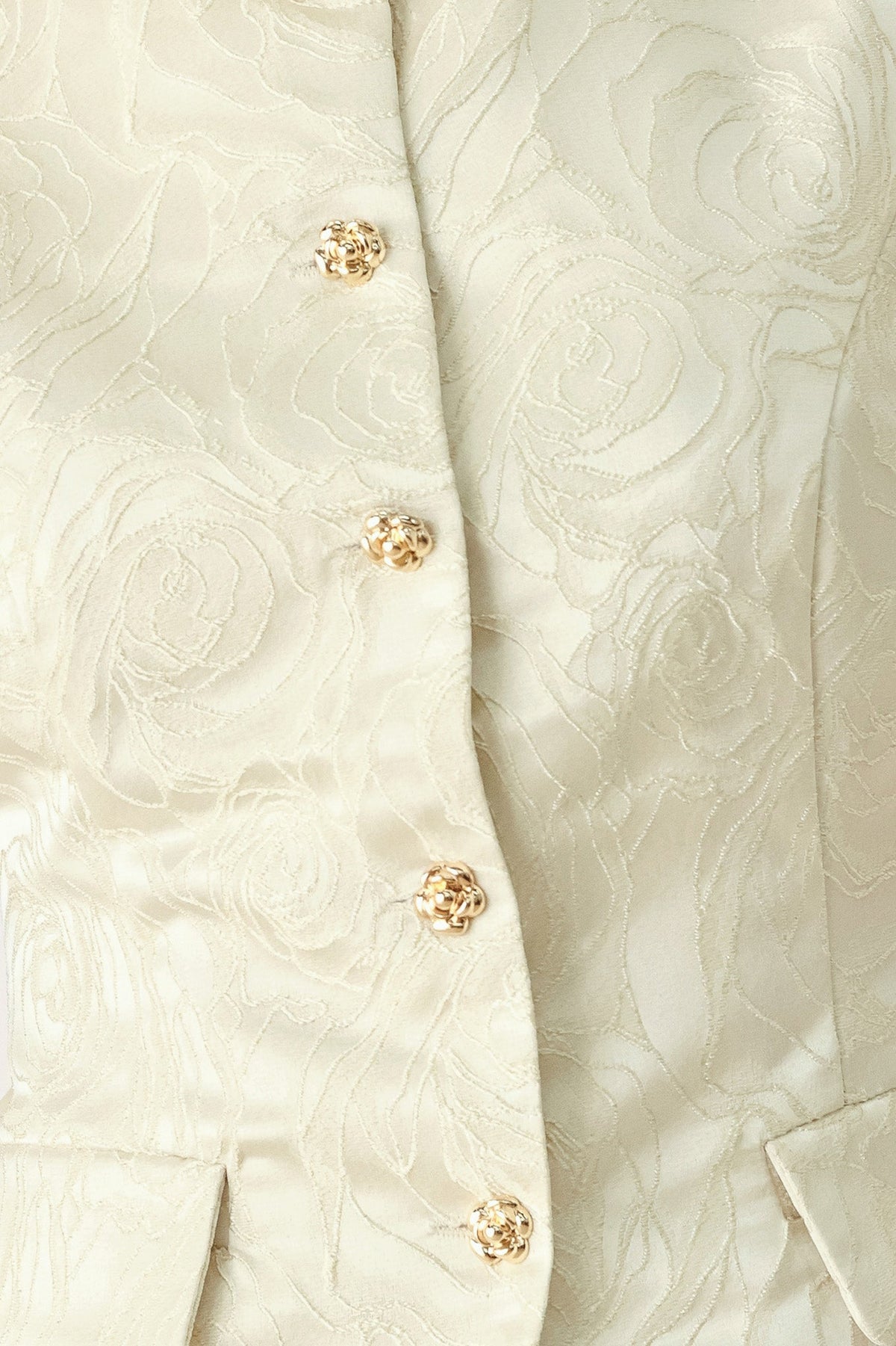CHALECO DE JACQUARD TEJIDO CON MOTIVOS FLORALES EN TONO MAZAPÁN