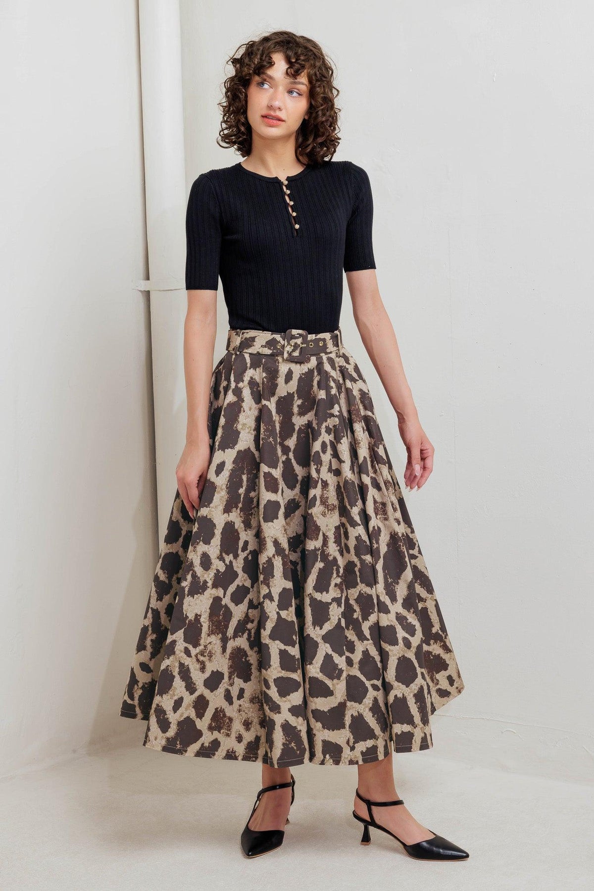 FALDA MIDI COMPLETA TEJIDA CON ESTAMPADO DE LEOPARDO