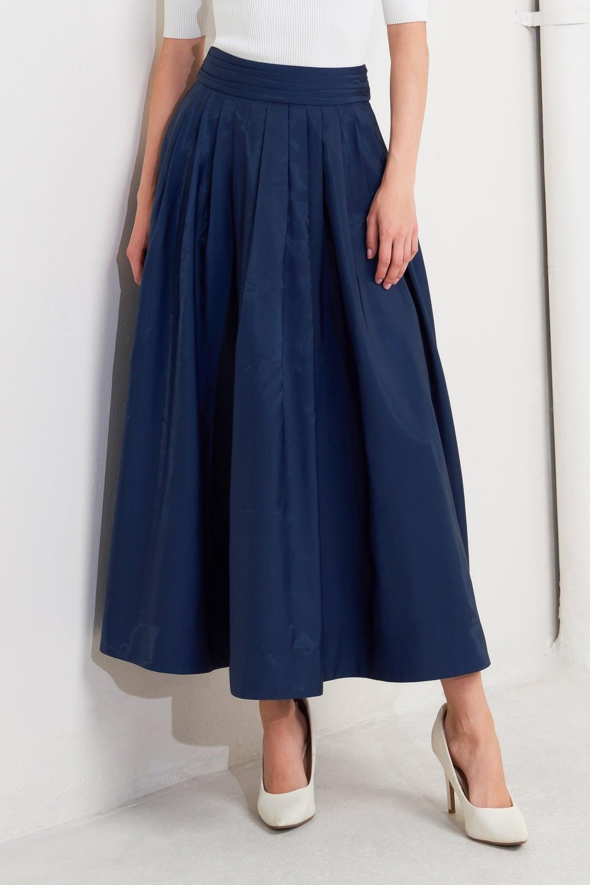 FALDA MIDI PLISADA DE TEJIDO ACAMPANADO LUXE