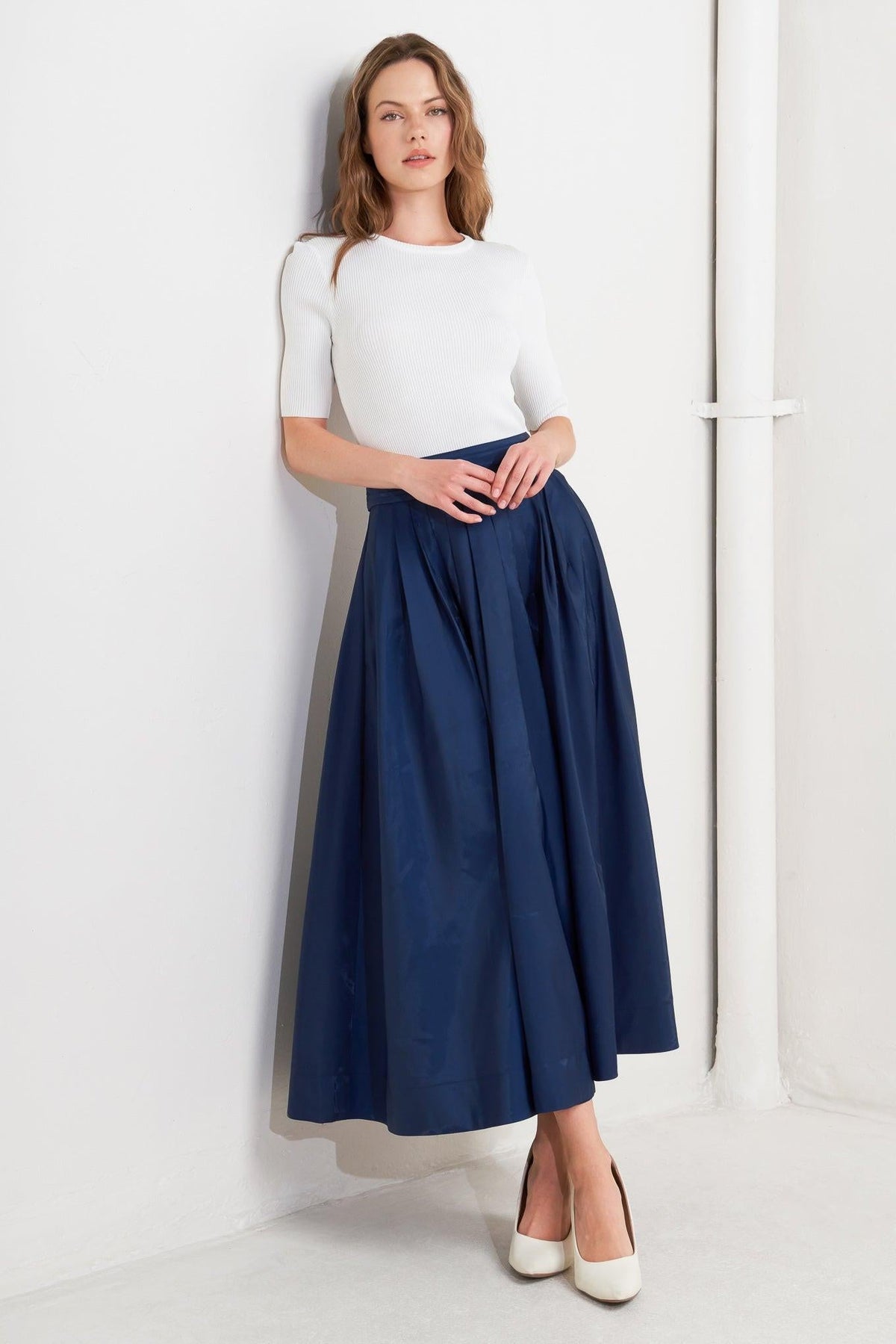 FALDA MIDI PLISADA DE TEJIDO ACAMPANADO LUXE