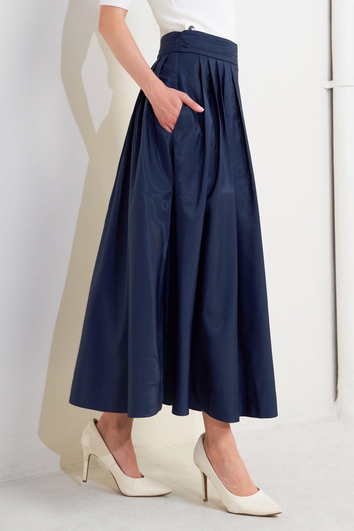 FALDA MIDI PLISADA DE TEJIDO ACAMPANADO LUXE
