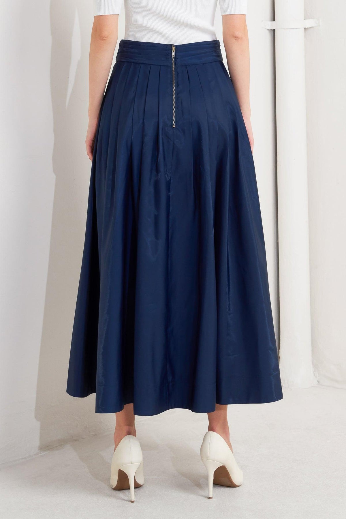 FALDA MIDI PLISADA DE TEJIDO ACAMPANADO LUXE