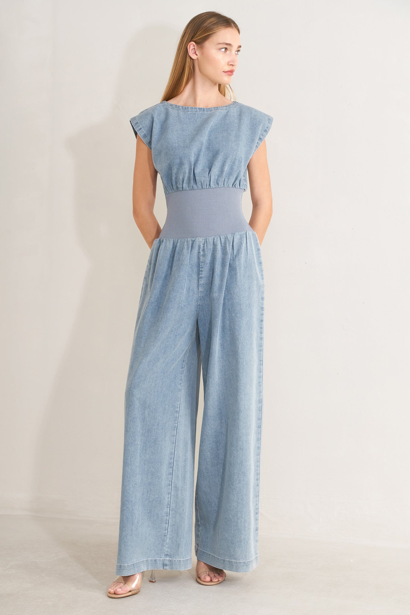 RUNNING IN DENIM JUMPSUIT