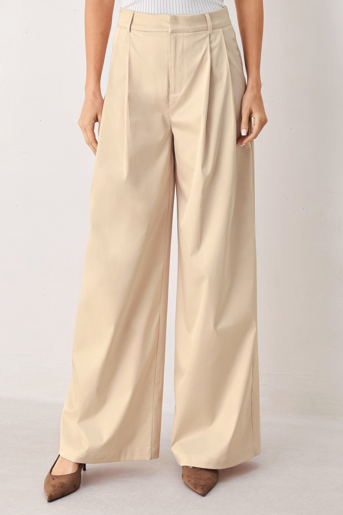 PANTALONES TEJIDOS DE CORTE RELAJADO COLOR PERGAMINO