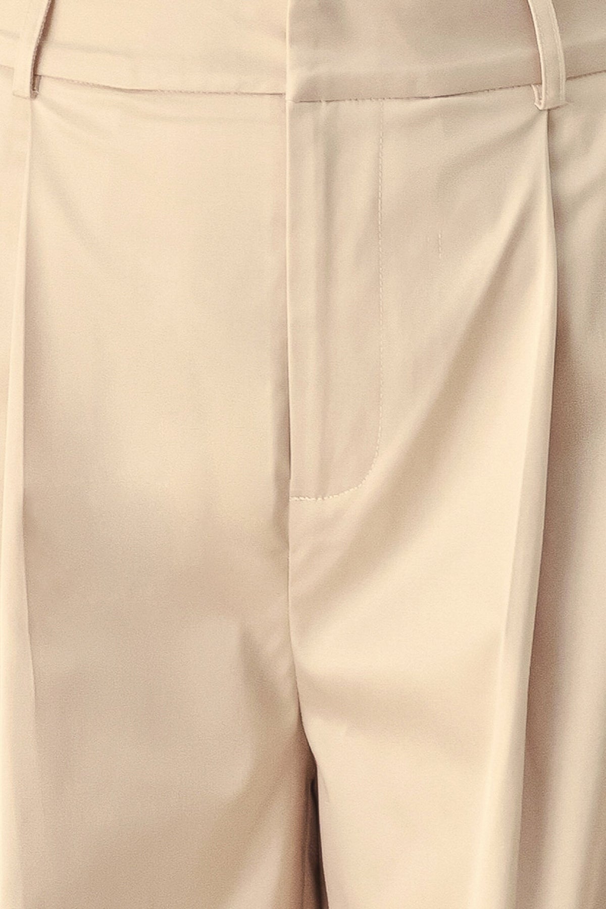 PANTALONES TEJIDOS DE CORTE RELAJADO COLOR PERGAMINO