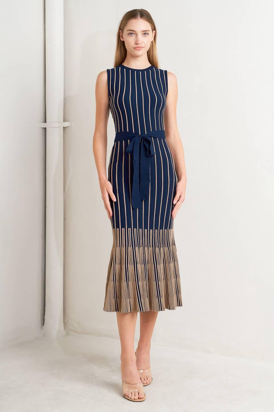 VESTIDO MIDI DE PUNTO CON CAÍDA Y TEXTURA SUAVE
