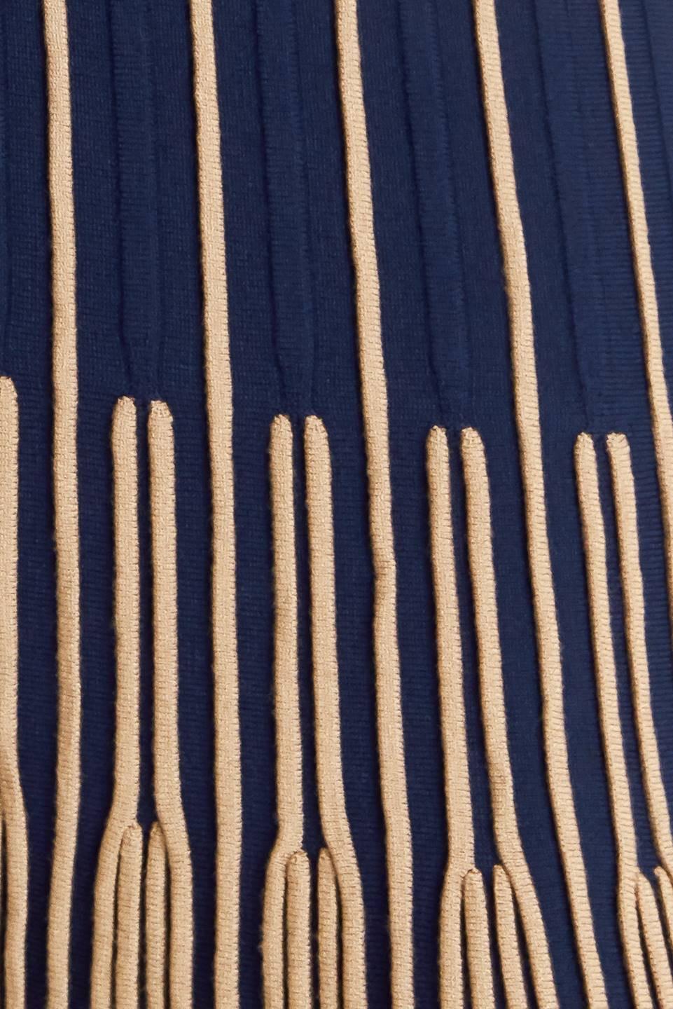 VESTIDO MIDI DE PUNTO CON CAÍDA Y TEXTURA SUAVE