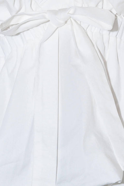 SLOW DOWN IN WHITE WOVEN TOP