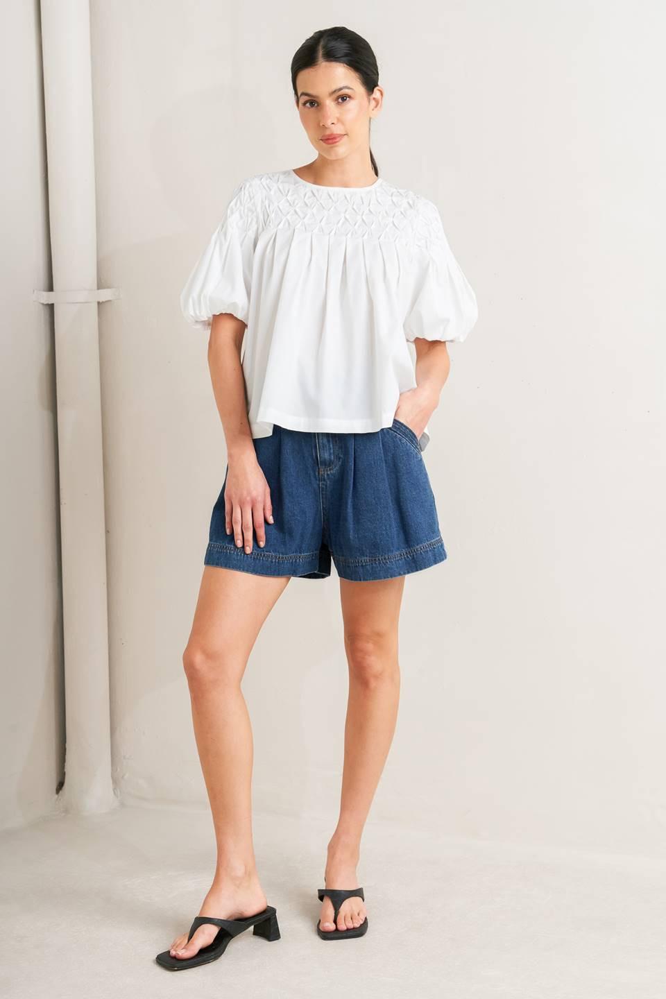 TOP TEJIDO BLANCO DE MANGAS ABULLONADAS