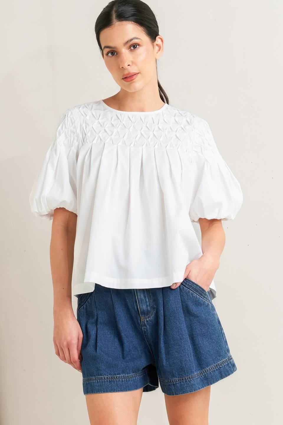 TOP TEJIDO BLANCO DE MANGAS ABULLONADAS