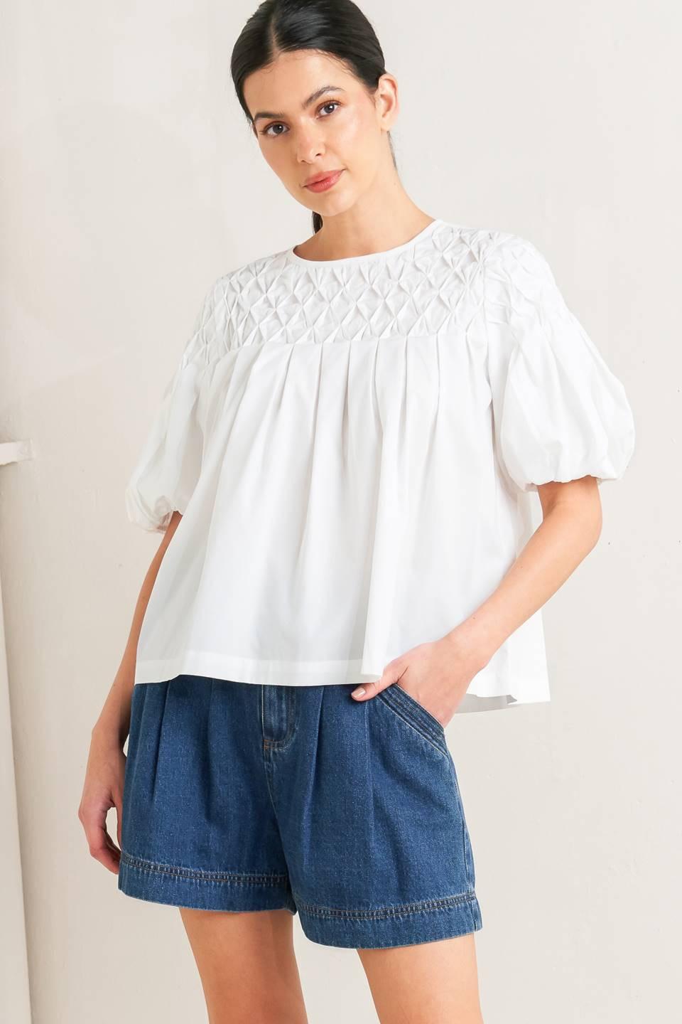 TOP TEJIDO BLANCO DE MANGAS ABULLONADAS
