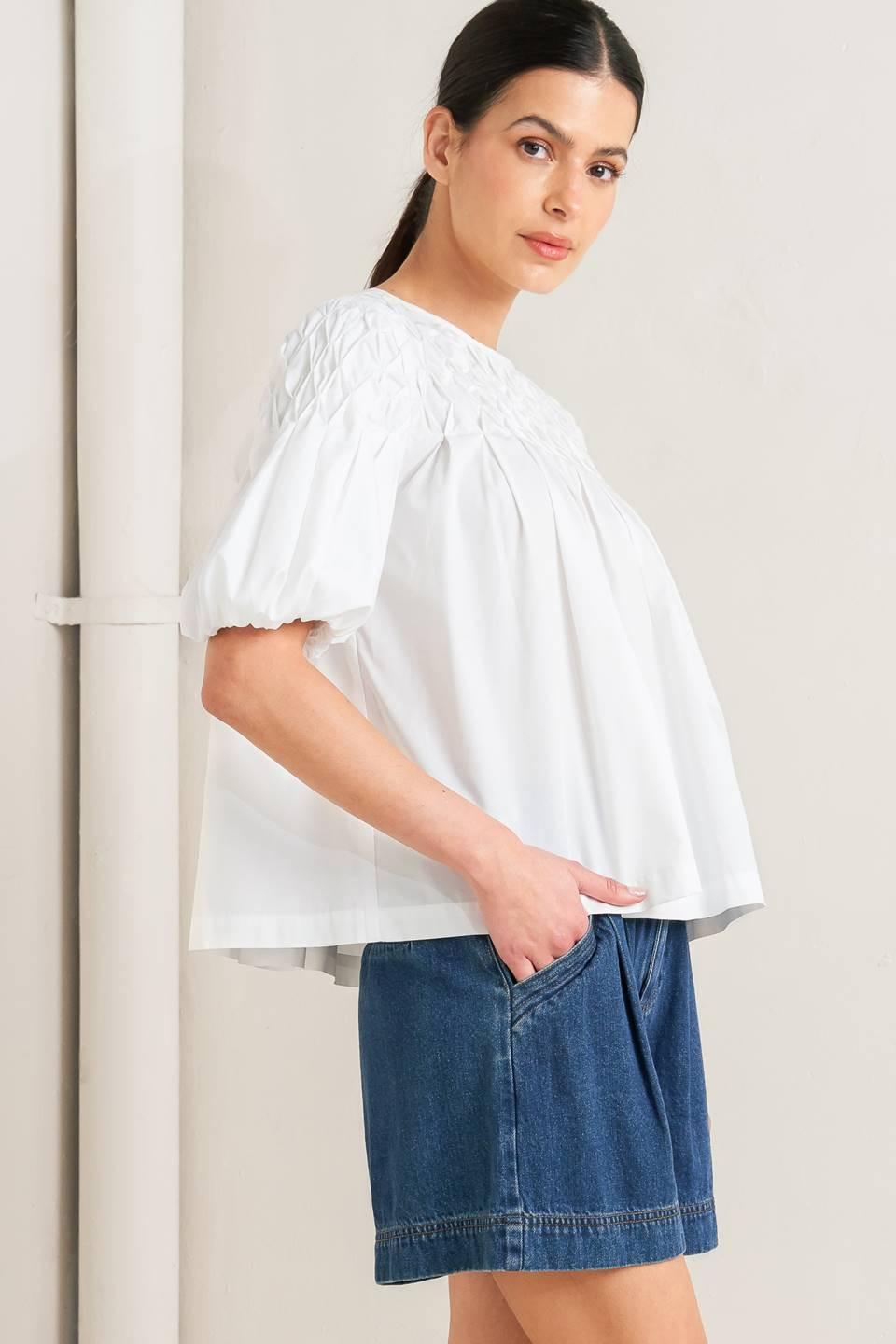 TOP TEJIDO BLANCO DE MANGAS ABULLONADAS