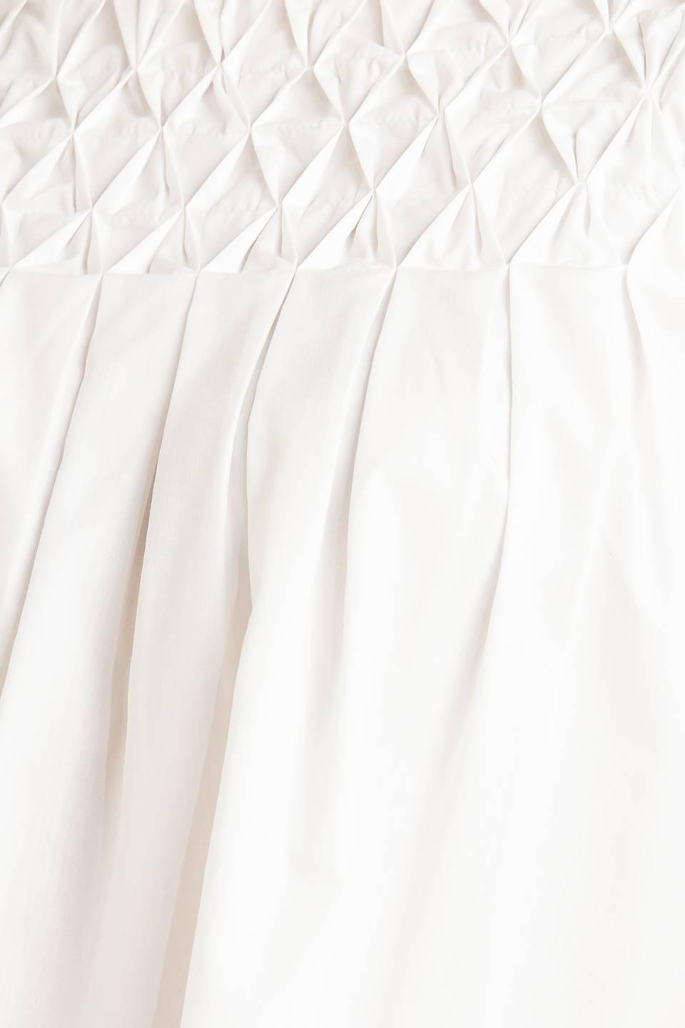 TOP TEJIDO BLANCO DE MANGAS ABULLONADAS