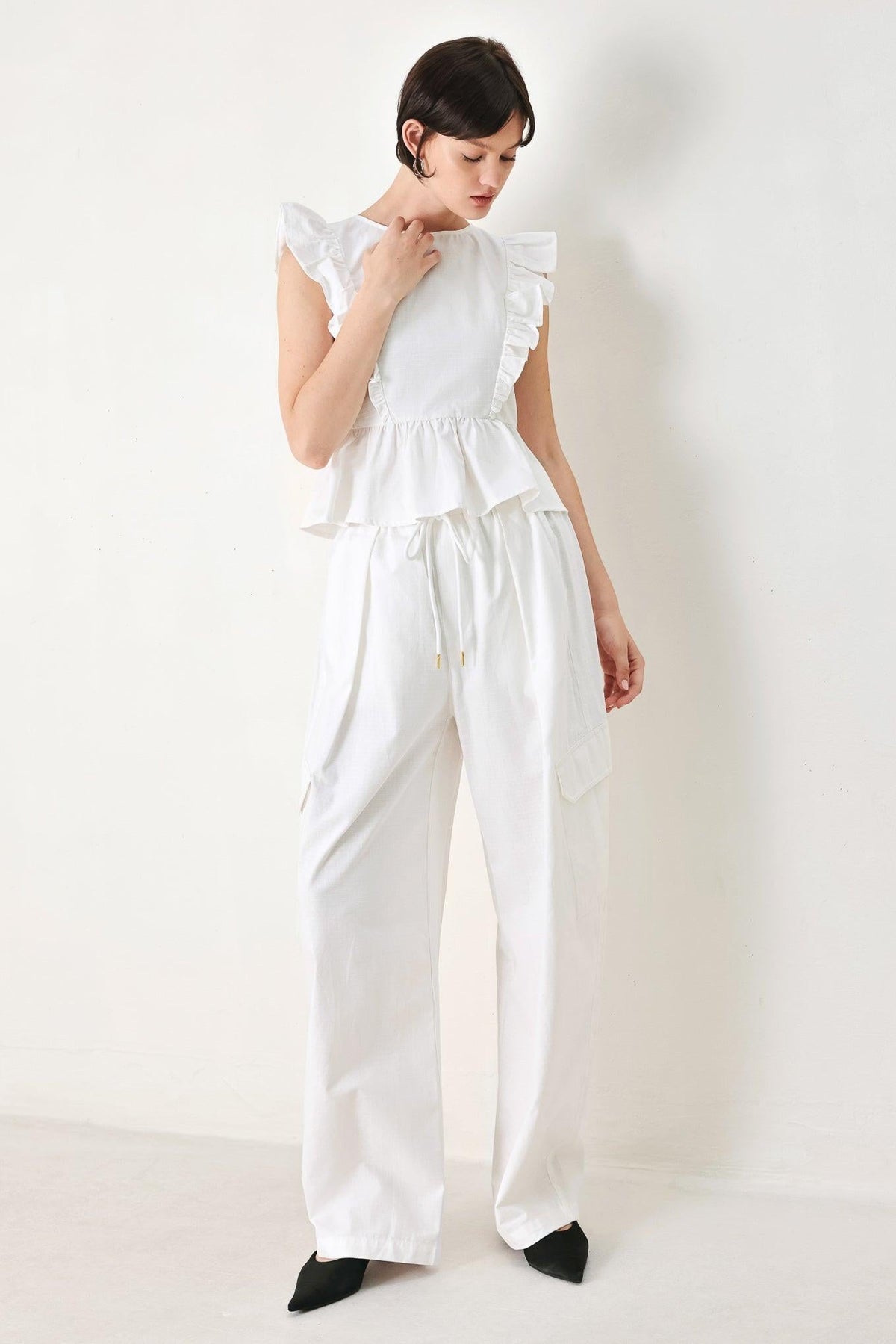 BLUSA TEJIDA DE FLORES BLANCAS