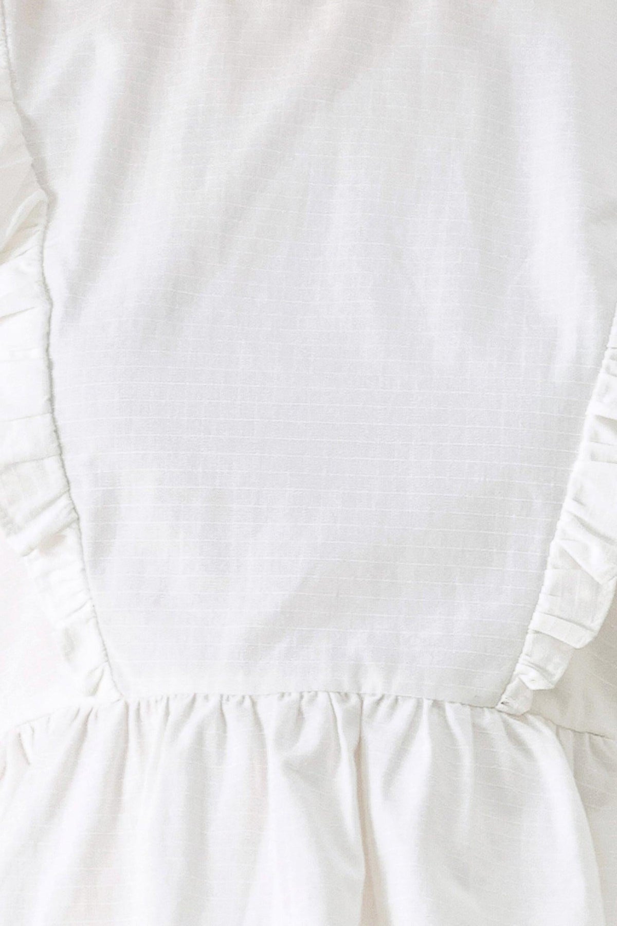 BLUSA TEJIDA DE FLORES BLANCAS