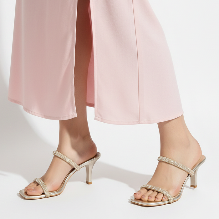 Evara - Tacones de aguja dorados