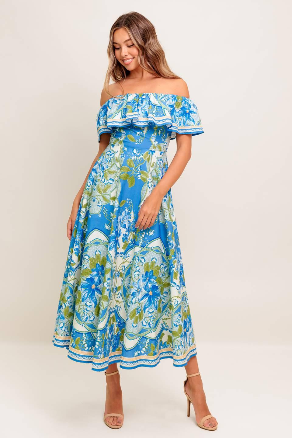 VESTIDO MIDI TEJIDO AZUL POLVO CON ESTAMPADO TROPICAL