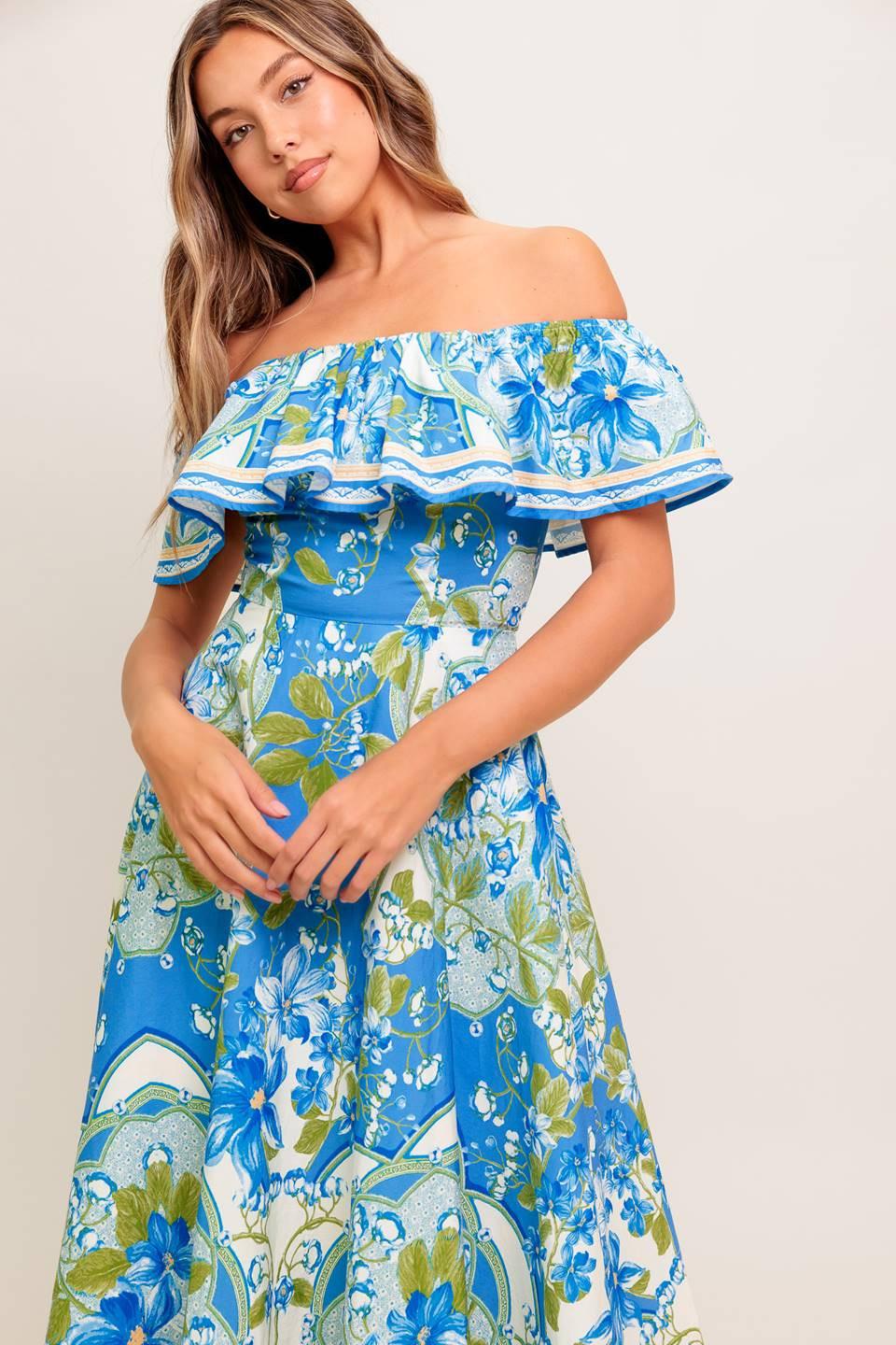 VESTIDO MIDI TEJIDO AZUL POLVO CON ESTAMPADO TROPICAL
