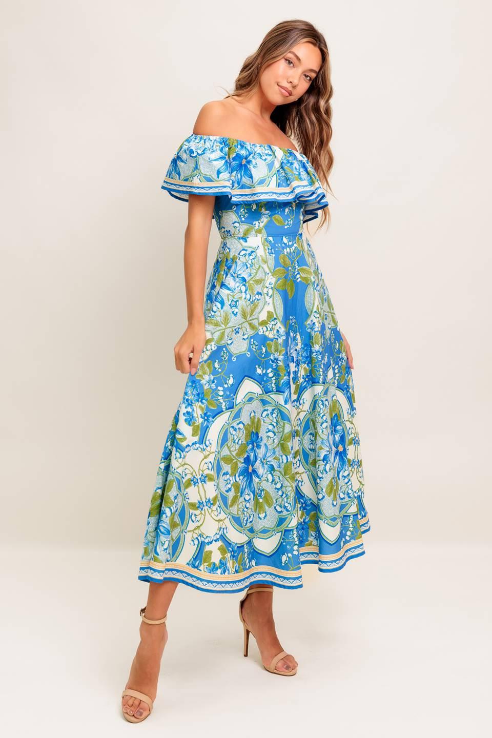 VESTIDO MIDI TEJIDO AZUL POLVO CON ESTAMPADO TROPICAL