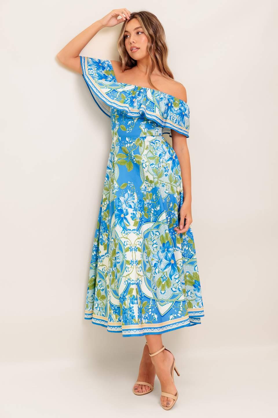 VESTIDO MIDI TEJIDO AZUL POLVO CON ESTAMPADO TROPICAL