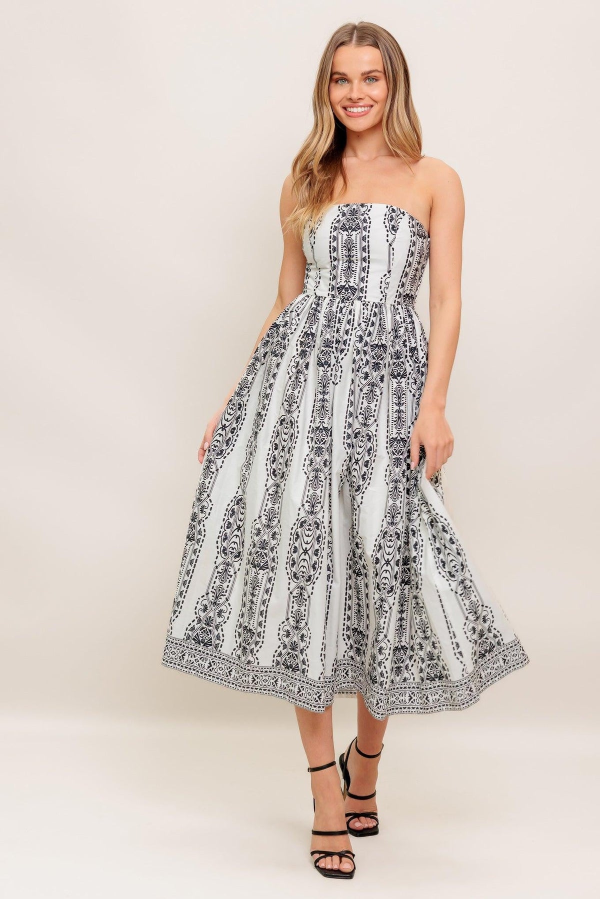 VESTIDO MIDI TEJIDO SILUETA DE VERANO