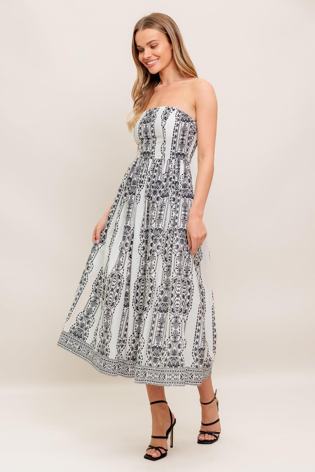 VESTIDO MIDI TEJIDO SILUETA DE VERANO