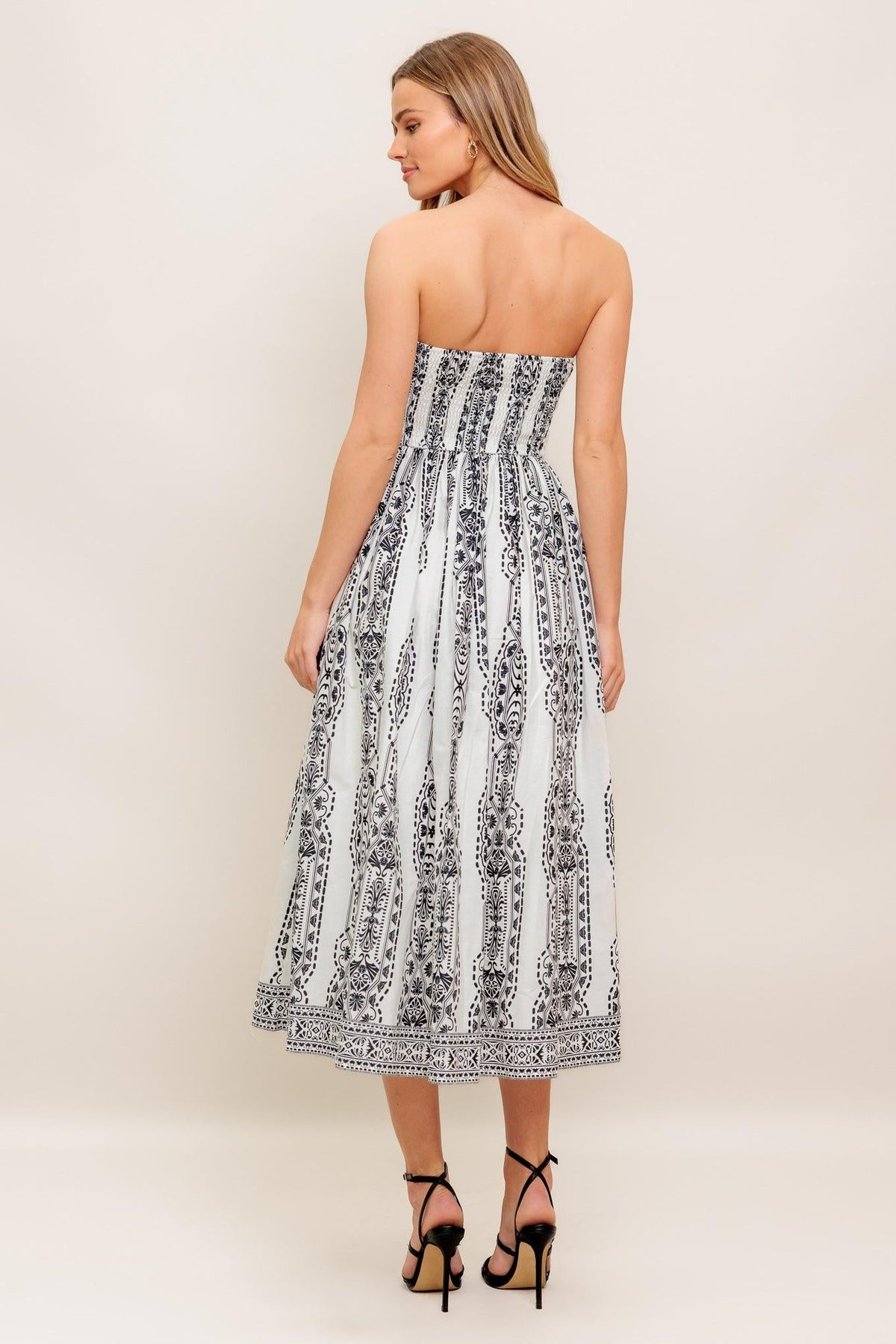 VESTIDO MIDI TEJIDO SILUETA DE VERANO