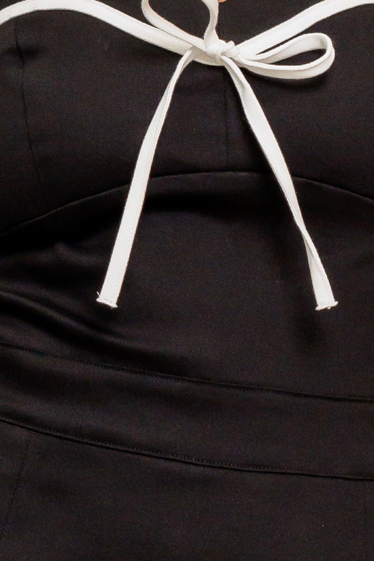 MONO CON FALDA PANTALÓN TEJIDA COUTURE NOIR BOW