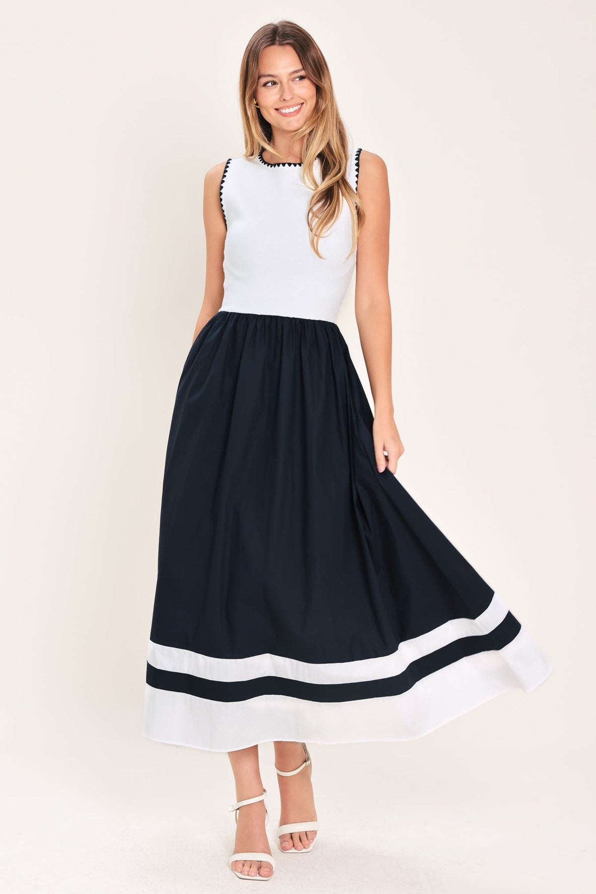 VESTIDO MIDI DE COMBINACIÓN TEJIDA Y ELEGANCIA COTIDIANA
