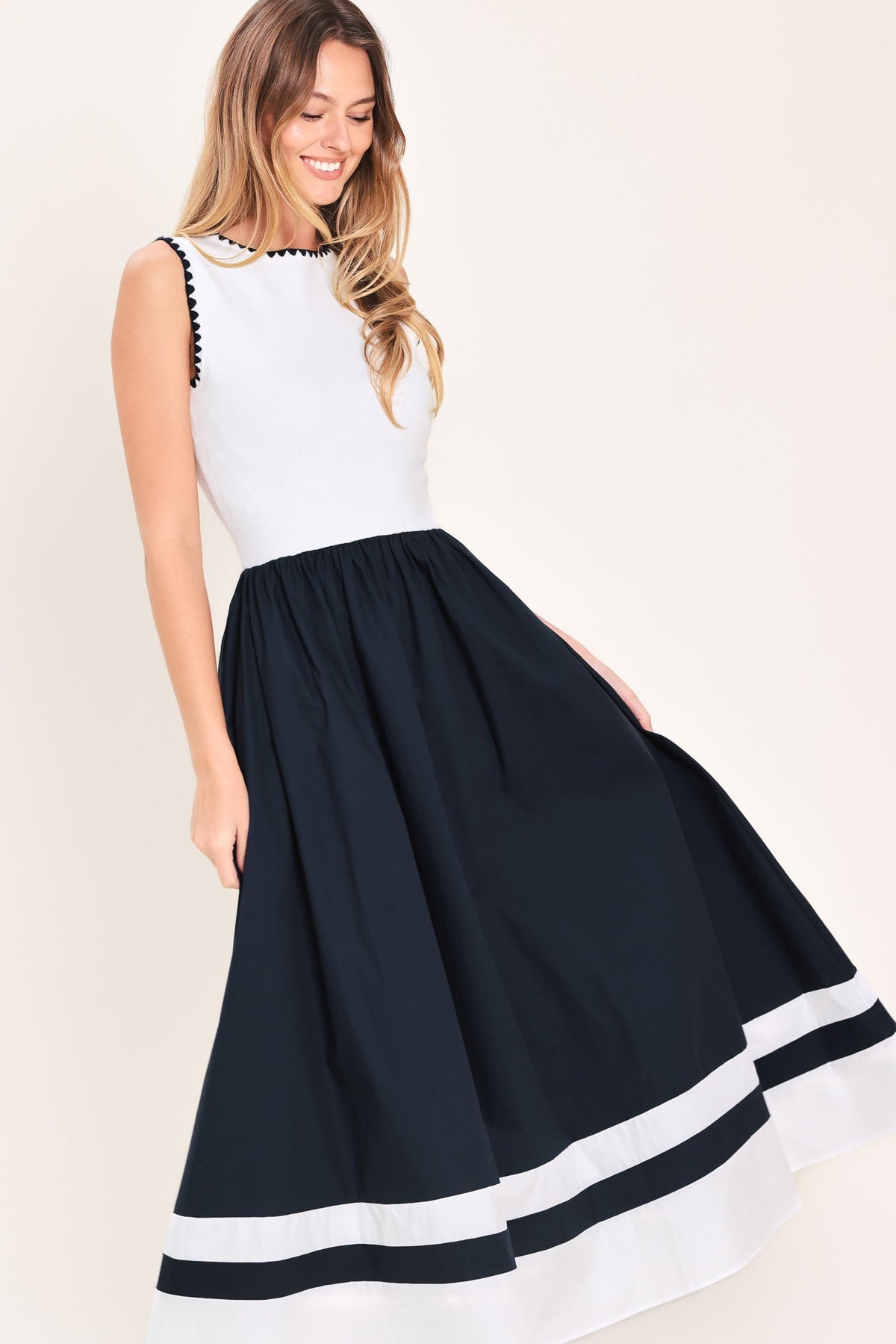 VESTIDO MIDI DE COMBINACIÓN TEJIDA Y ELEGANCIA COTIDIANA