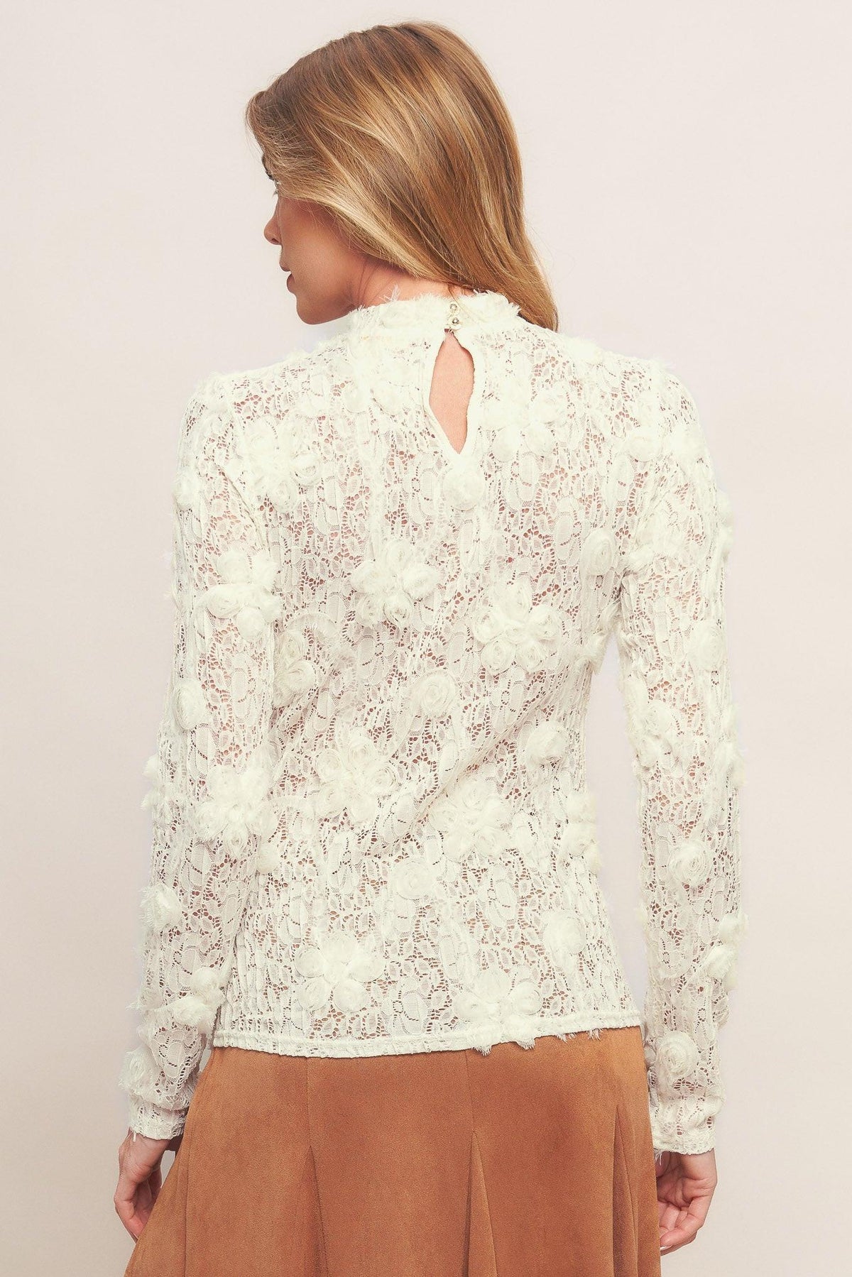 TOP DE JERSEY FLORAL TRANSPARENTE ROMÁNTICO