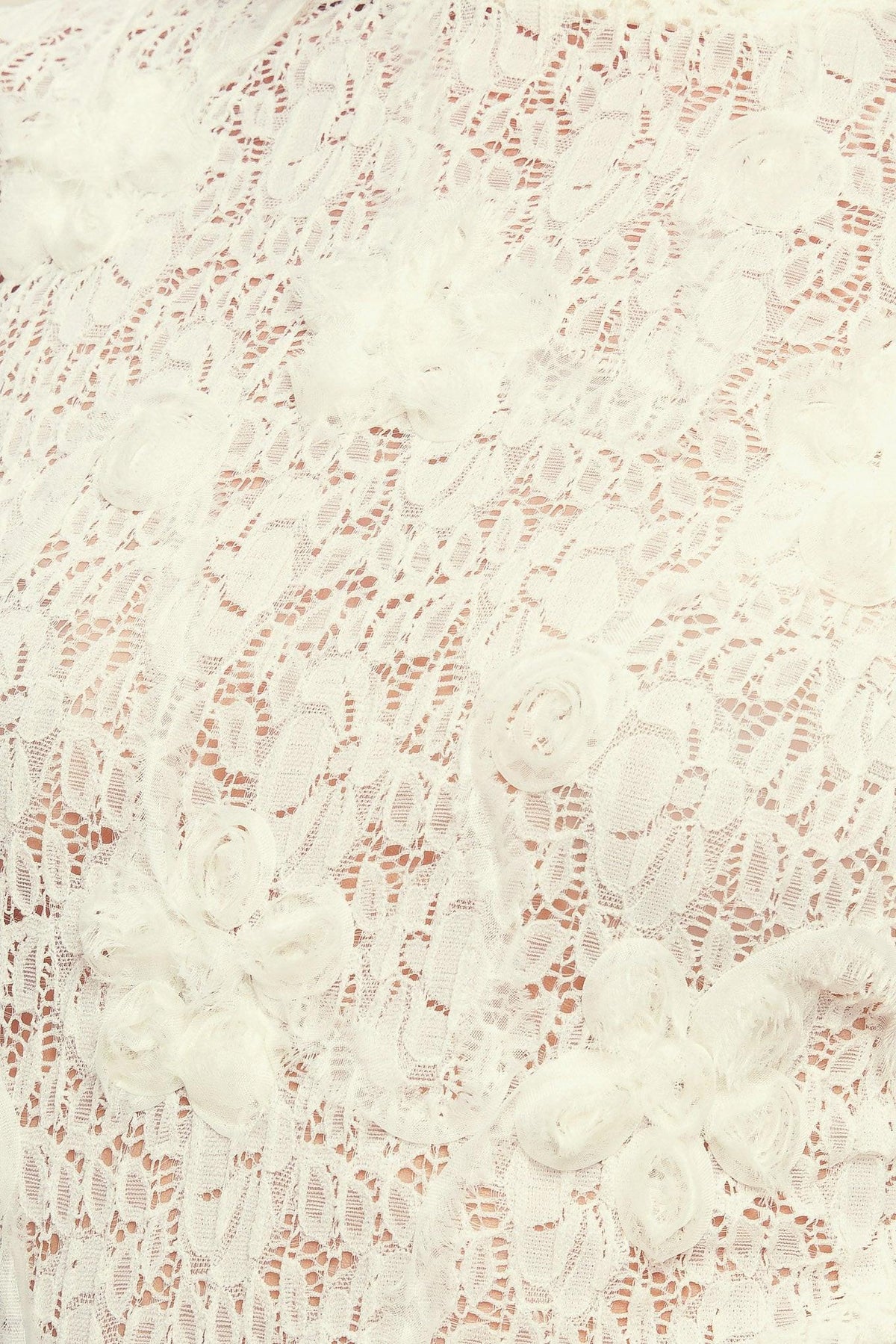TOP DE JERSEY FLORAL TRANSPARENTE ROMÁNTICO