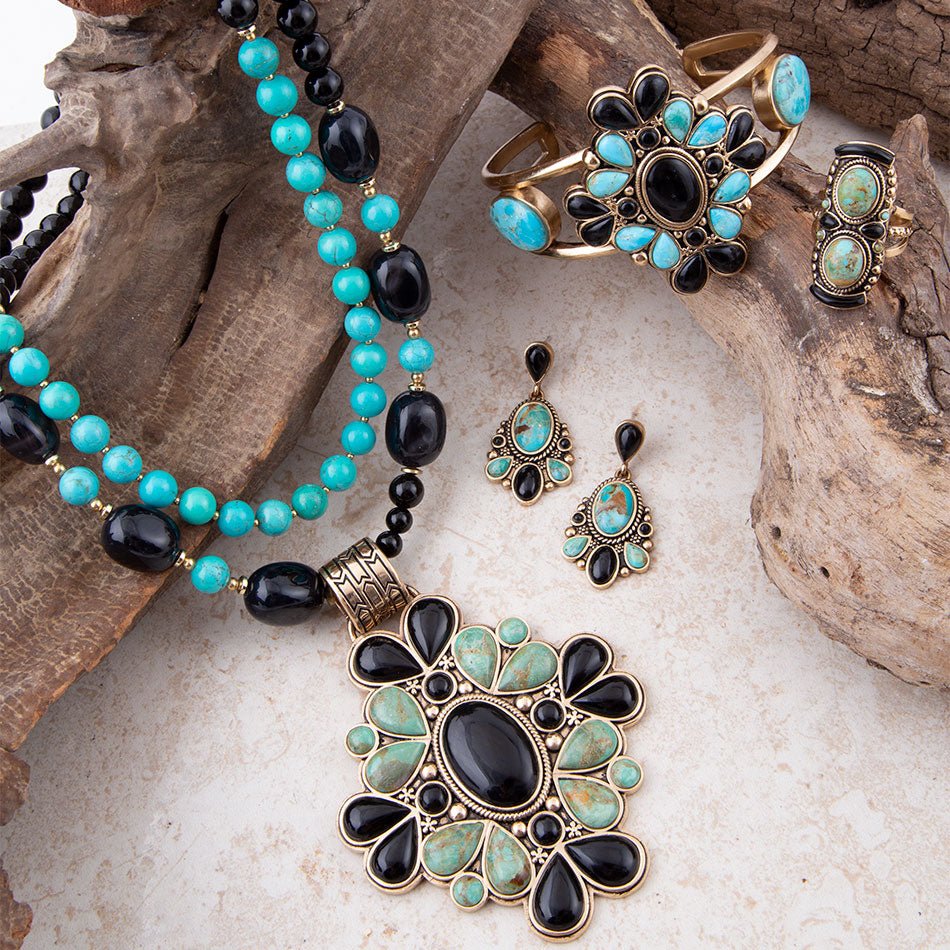 Pendientes largos dorados con turquesa azul Barcelona y ónix negro