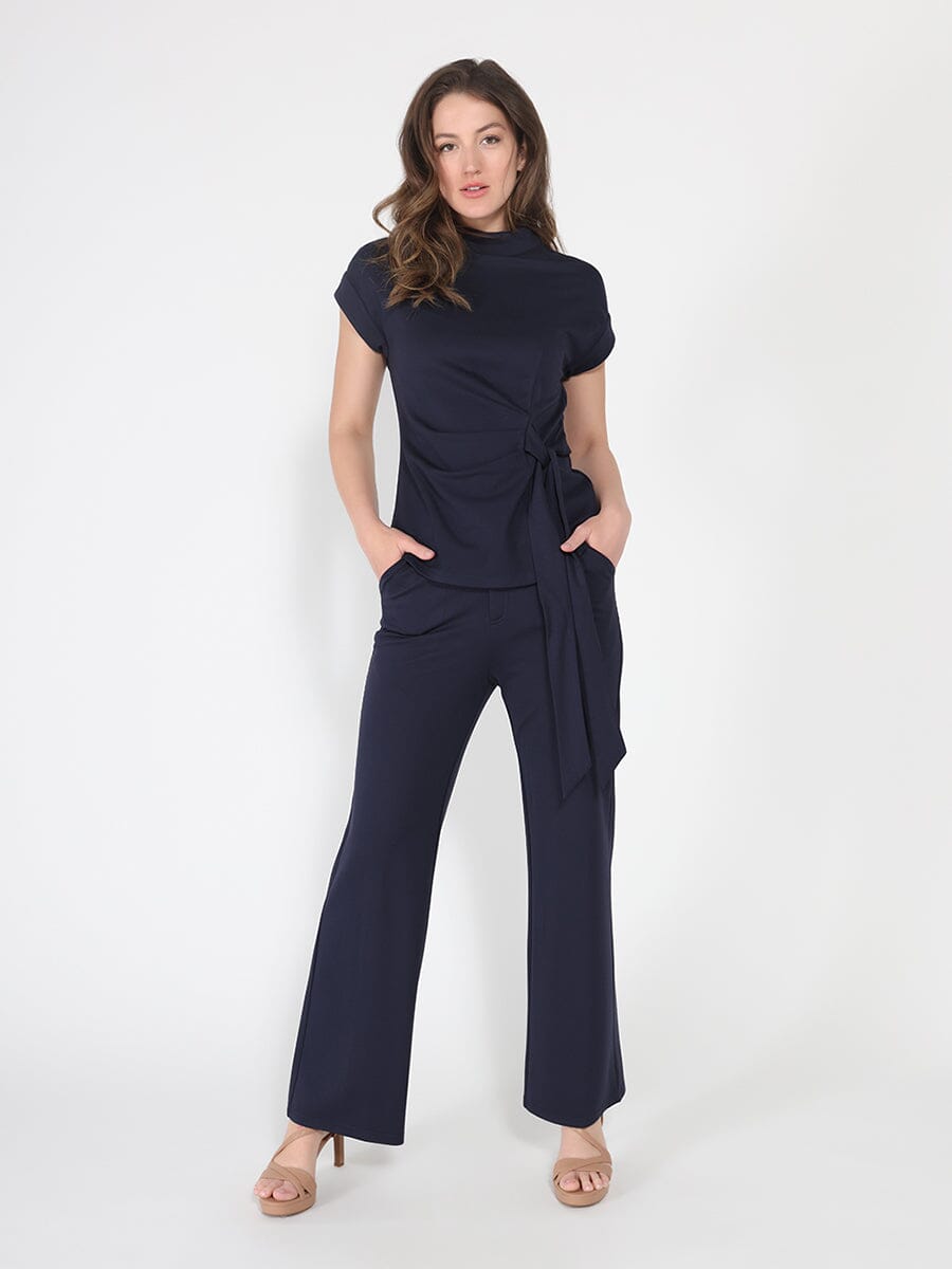 Blusa Gracia Fashion para mujer de cuello alto con detalle de lazo y manga corta en color liso