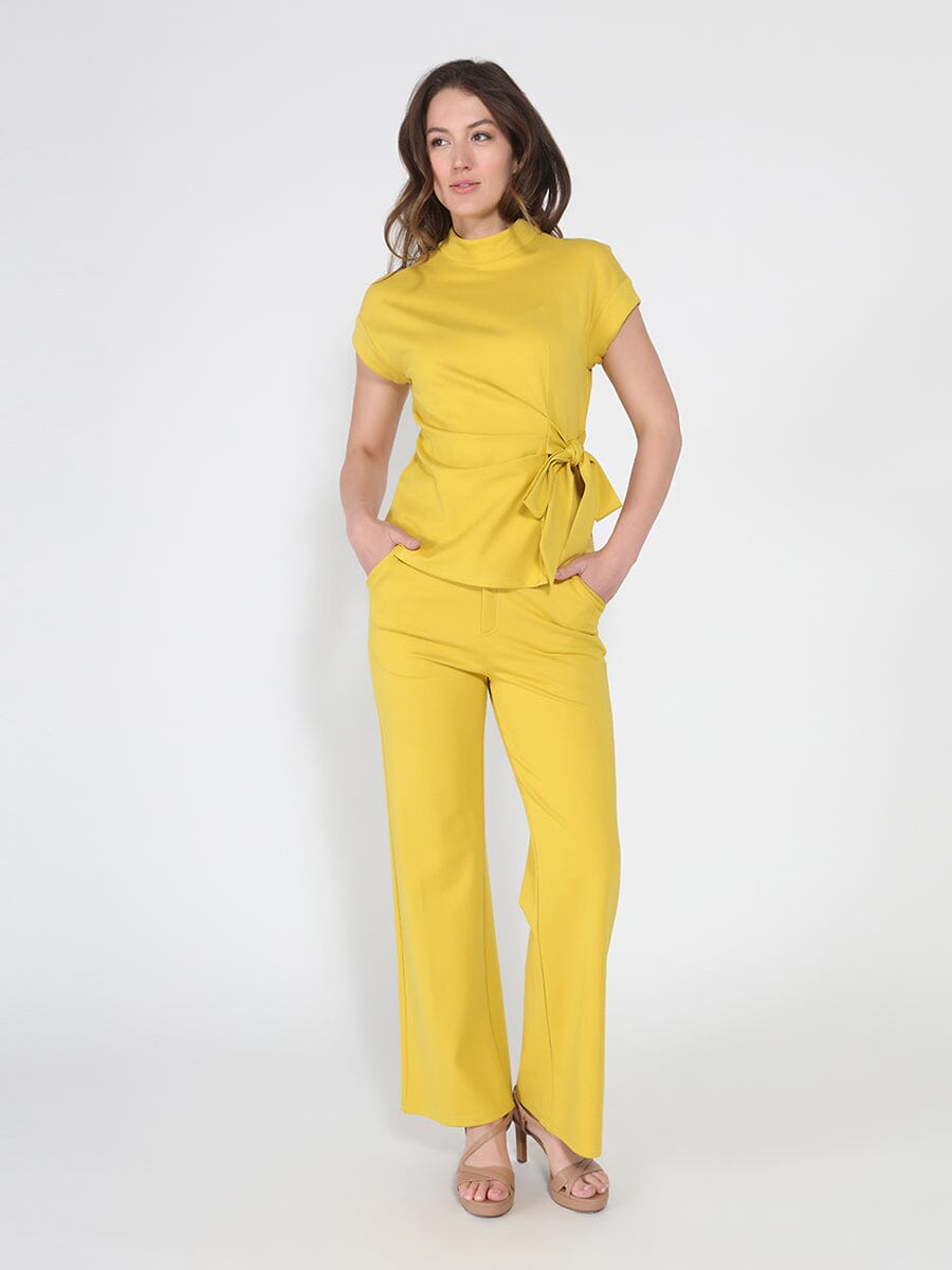 Blusa Gracia Fashion para mujer de cuello alto con detalle de lazo y manga corta en color liso