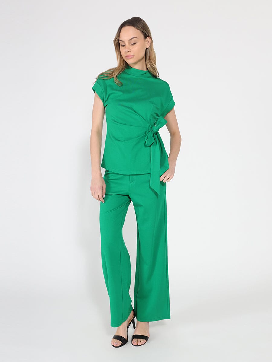 Blusa Gracia Fashion para mujer de cuello alto con detalle de lazo y manga corta en color liso