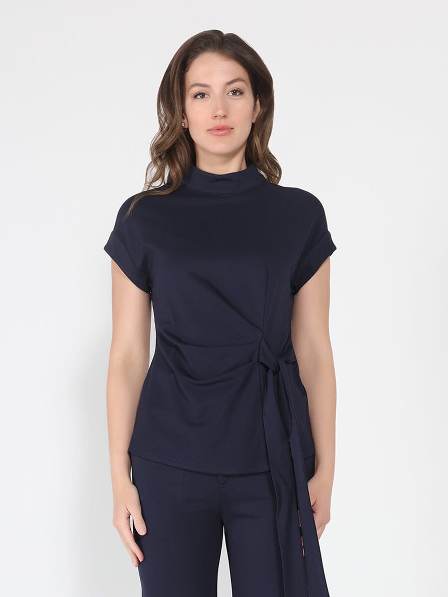 Blusa Gracia Fashion para mujer de cuello alto con detalle de lazo y manga corta en color liso