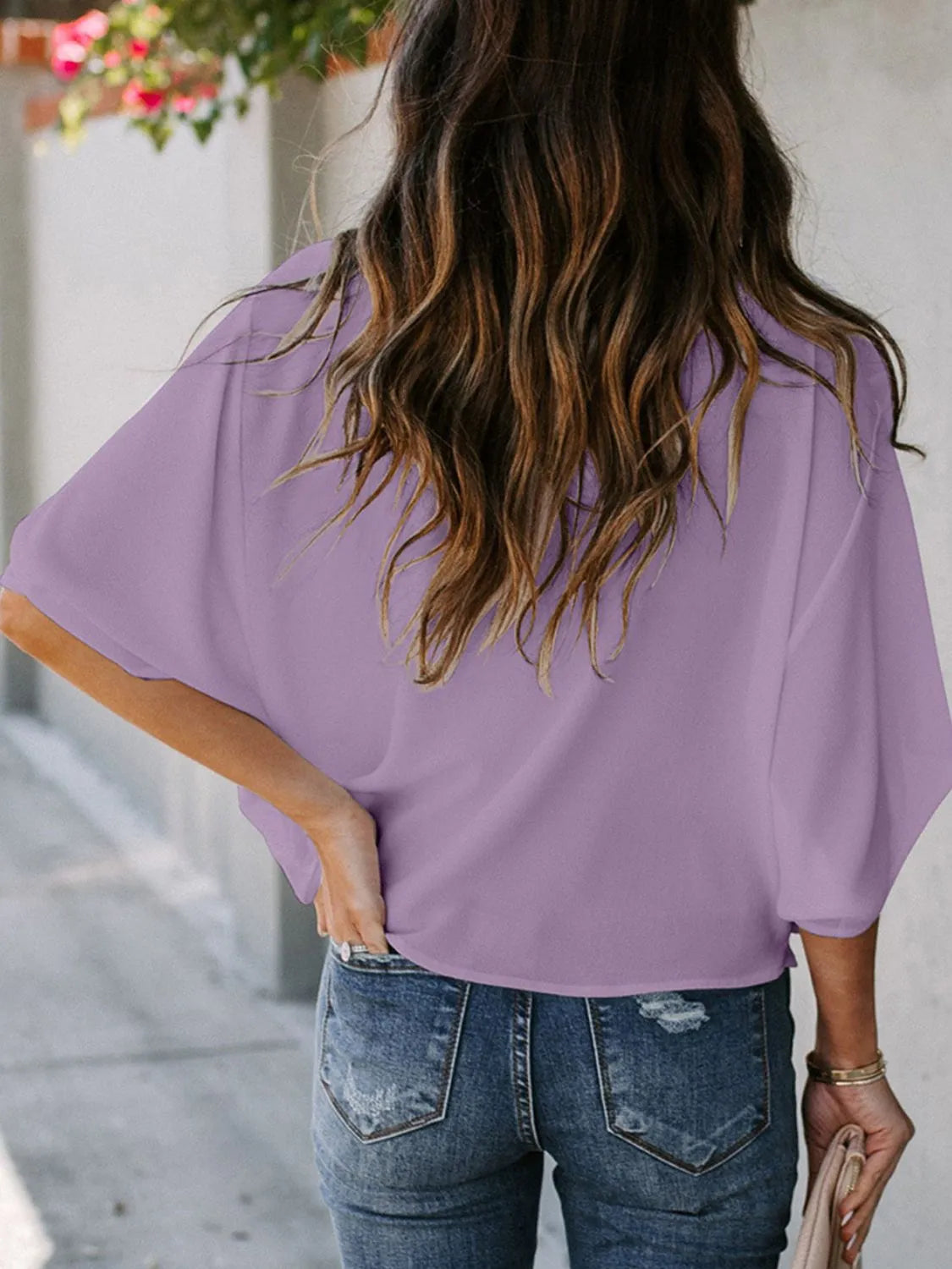 Trendsi lavender casual three-quarter sleeve blouse for women shown from the back with loose fit and flowy design