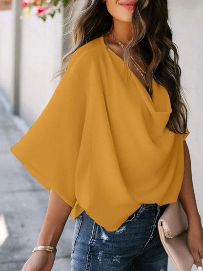 Trendsi mustard color stylish three-quarter sleeve blouse for women paired with denim jeans
