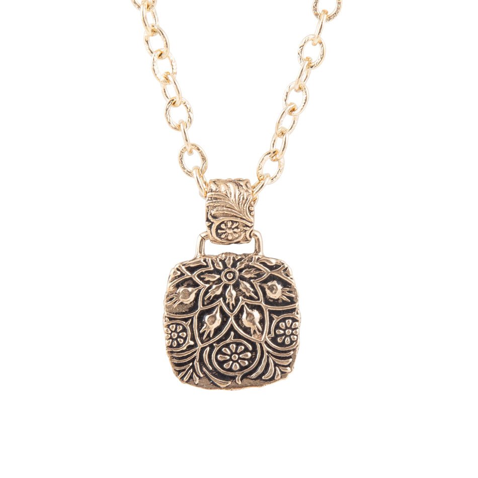 Collar con dije dorado de piedra de turquesa azul tallada