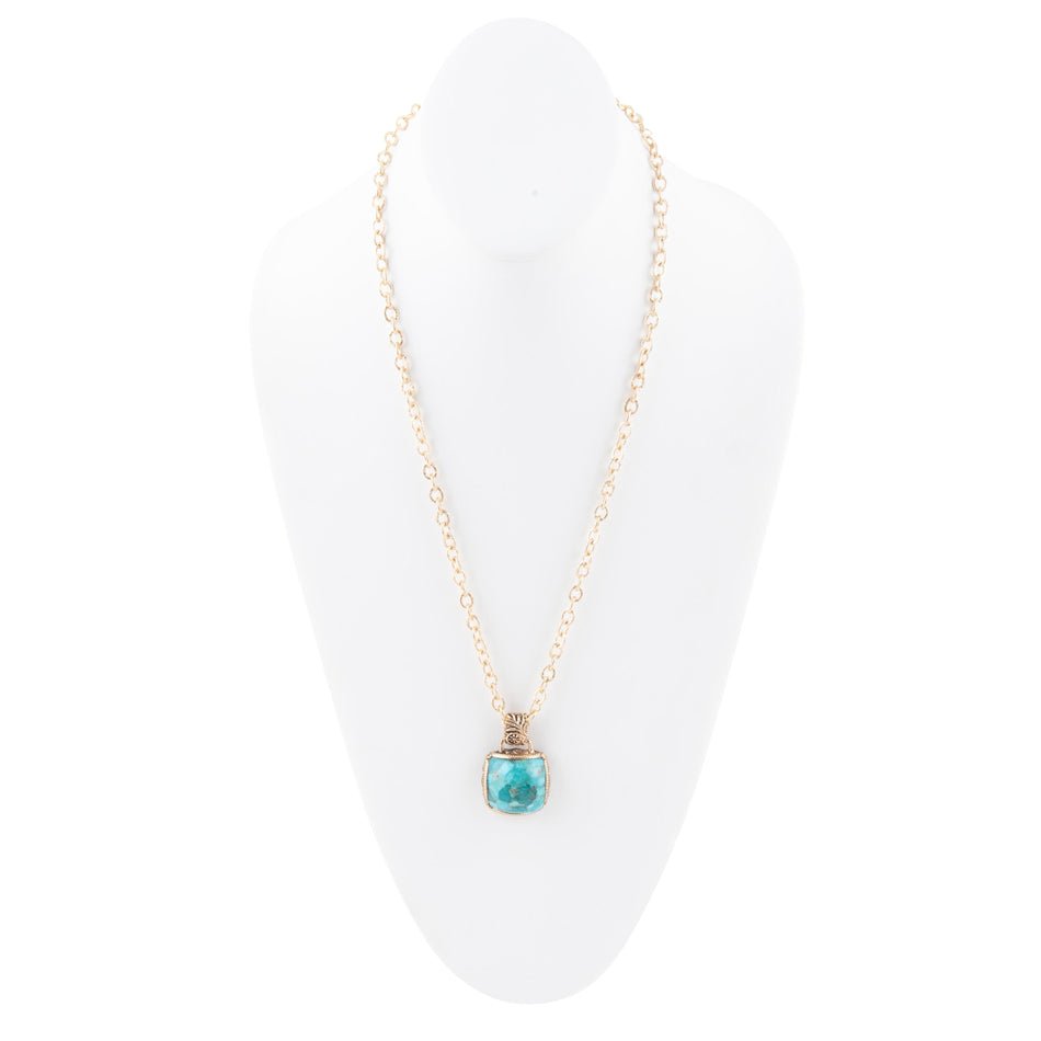 Collar con dije dorado de piedra de turquesa azul tallada